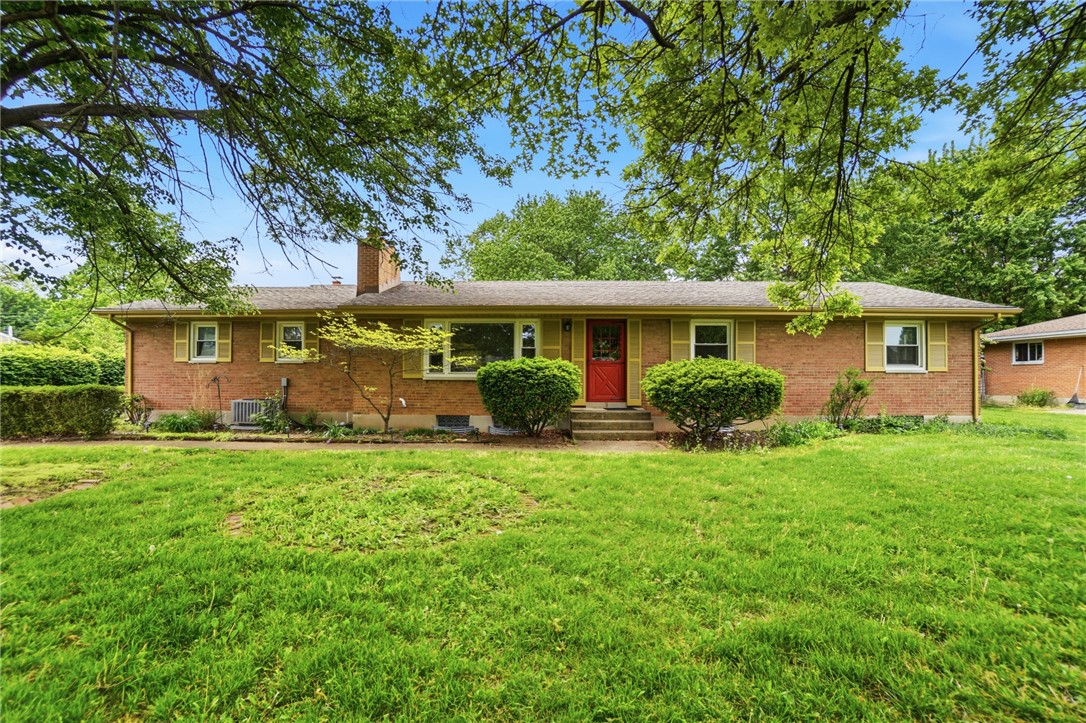 6119 Flemington Road Dayton, OH 45459 - Photo 1 of 76 This classic brick residence offers curb appeal with a bright red door and verdant landscaping.