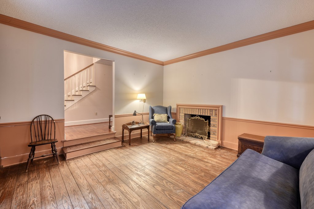 1837 Deep South Farm Road Blairsville, GA 30512 - Photo 46 of 76 a living room with furniture and a fireplace