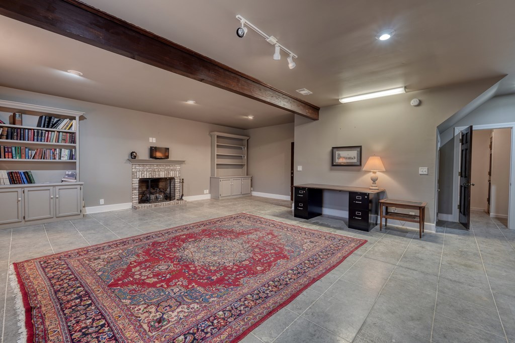 1837 Deep South Farm Road Blairsville, GA 30512 - Photo 57 of 76 a living room with furniture and a fireplace