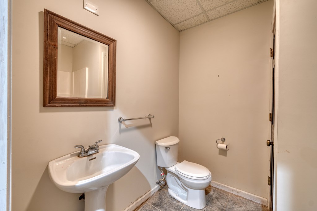 1837 Deep South Farm Road Blairsville, GA 30512 - Photo 58 of 76 a bathroom with a sink and mirror