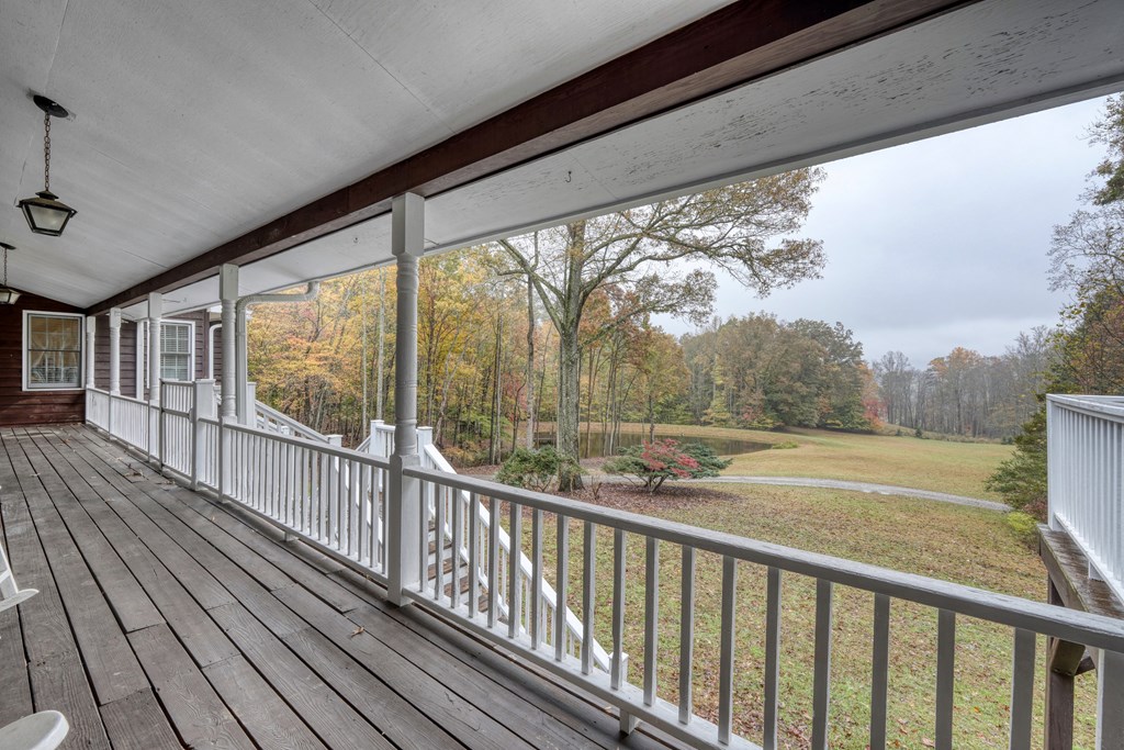 1837 Deep South Farm Road Blairsville, GA 30512 - Photo 69 of 76 a view of a balcony with wooden floor