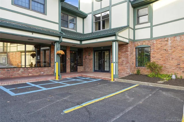a view of a brick building with a large windows