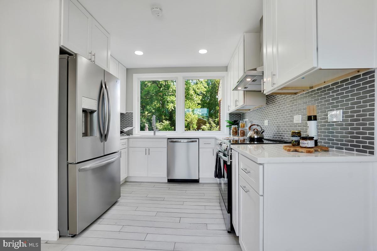 6600 Queens Chapel Road University Park, MD 20782 - Photo 19 of 72 Custom kitchen with tile floor