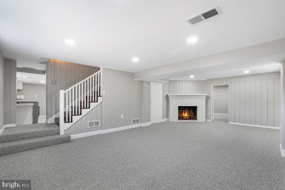6600 Queens Chapel Road University Park, MD 20782 - Photo 43 of 72 Family room with fireplace