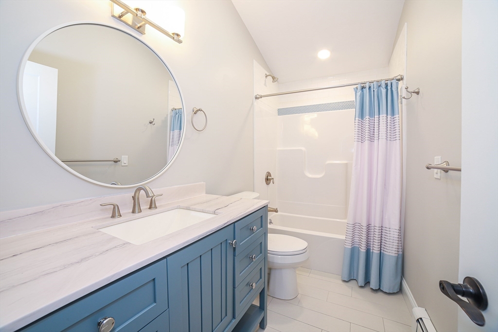 3 Woods Road Westminster, MA 01473 - Photo 29 of 42 a bathroom with a granite countertop sink a toilet and shower