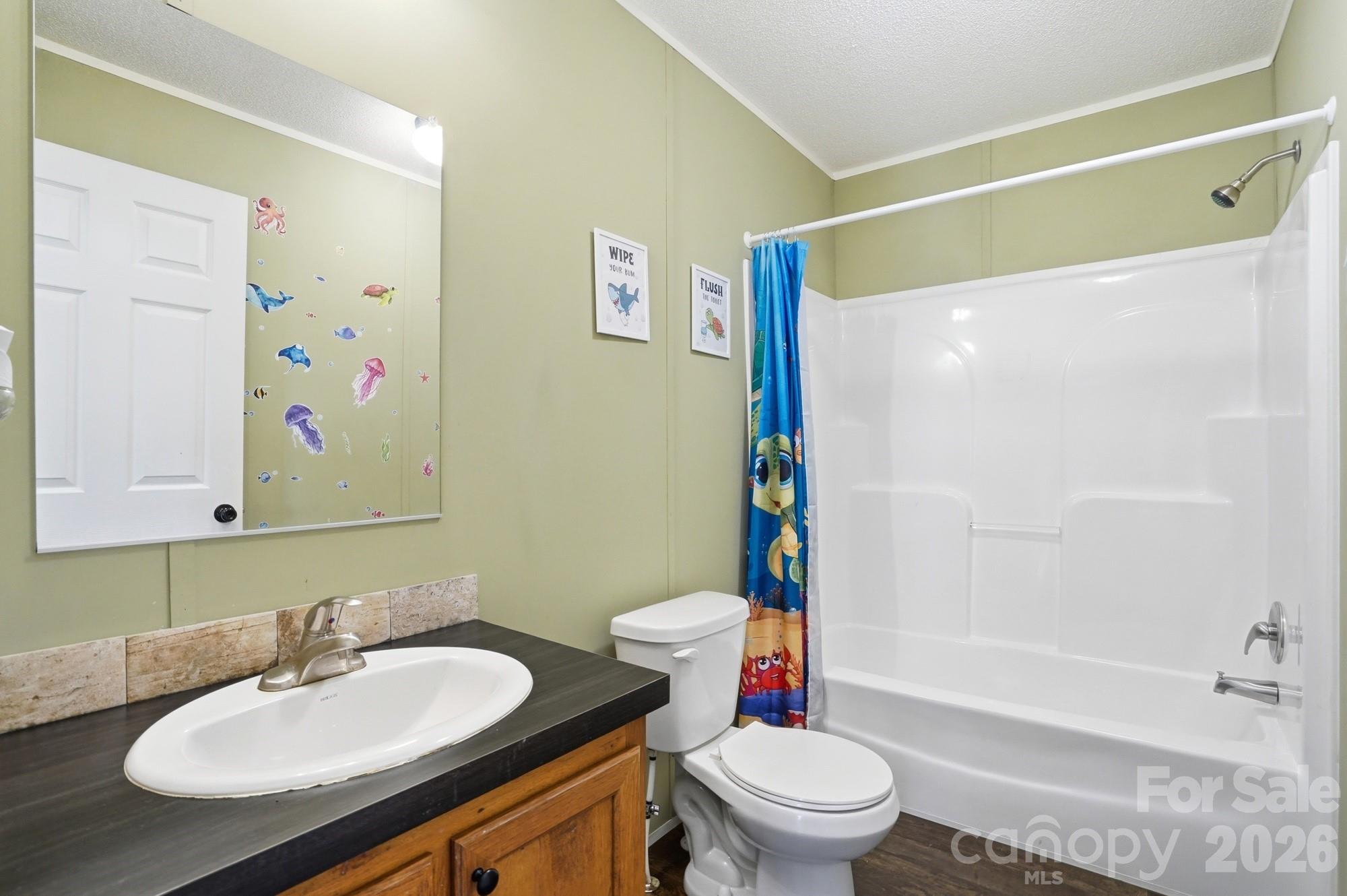 4111 Clontz Taylor Road Marshville, NC 28103 - Photo 16 of 27 a bathroom with a sink toilet and shower