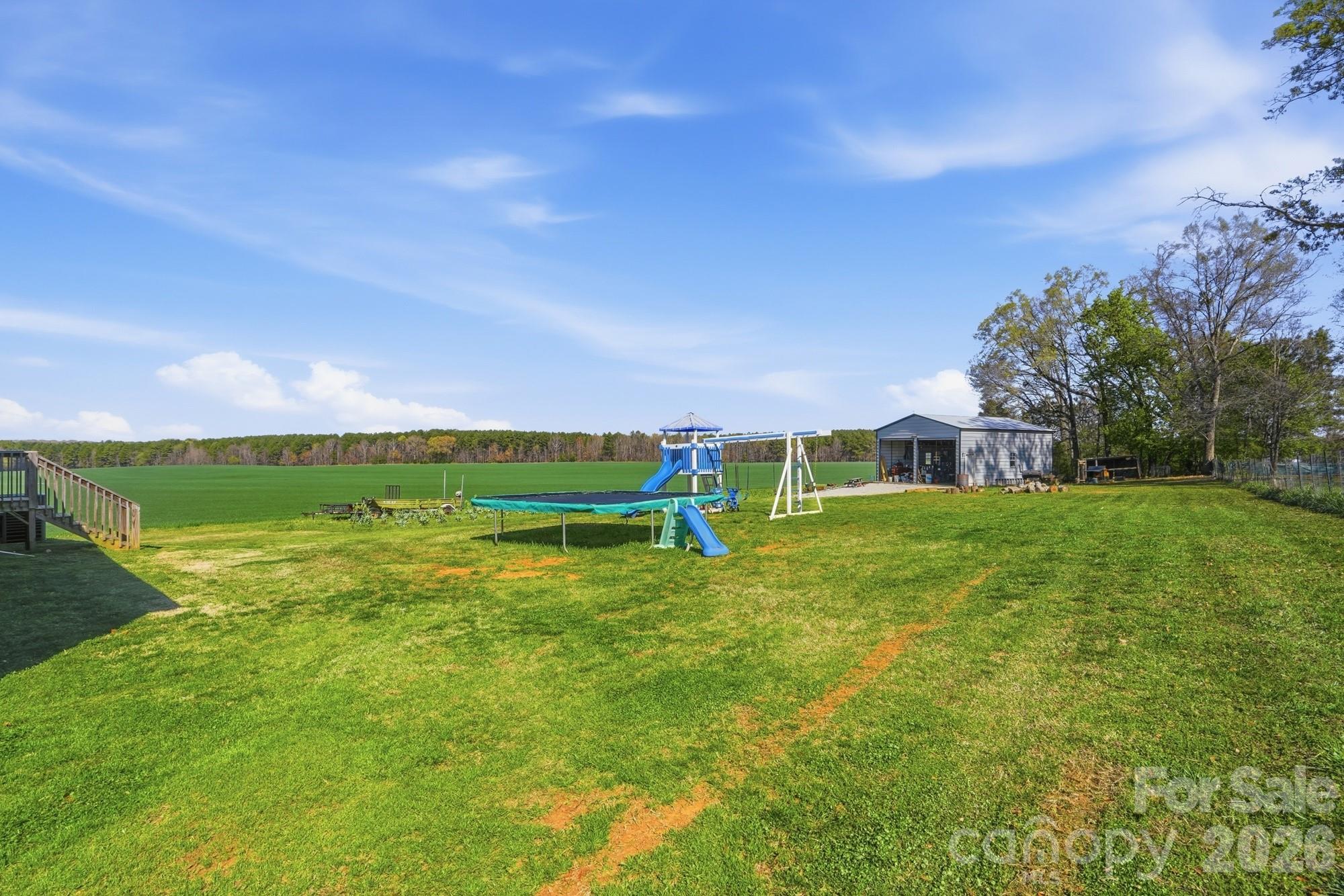 4111 Clontz Taylor Road Marshville, NC 28103 - Photo 23 of 27 a view of a field with sitting area