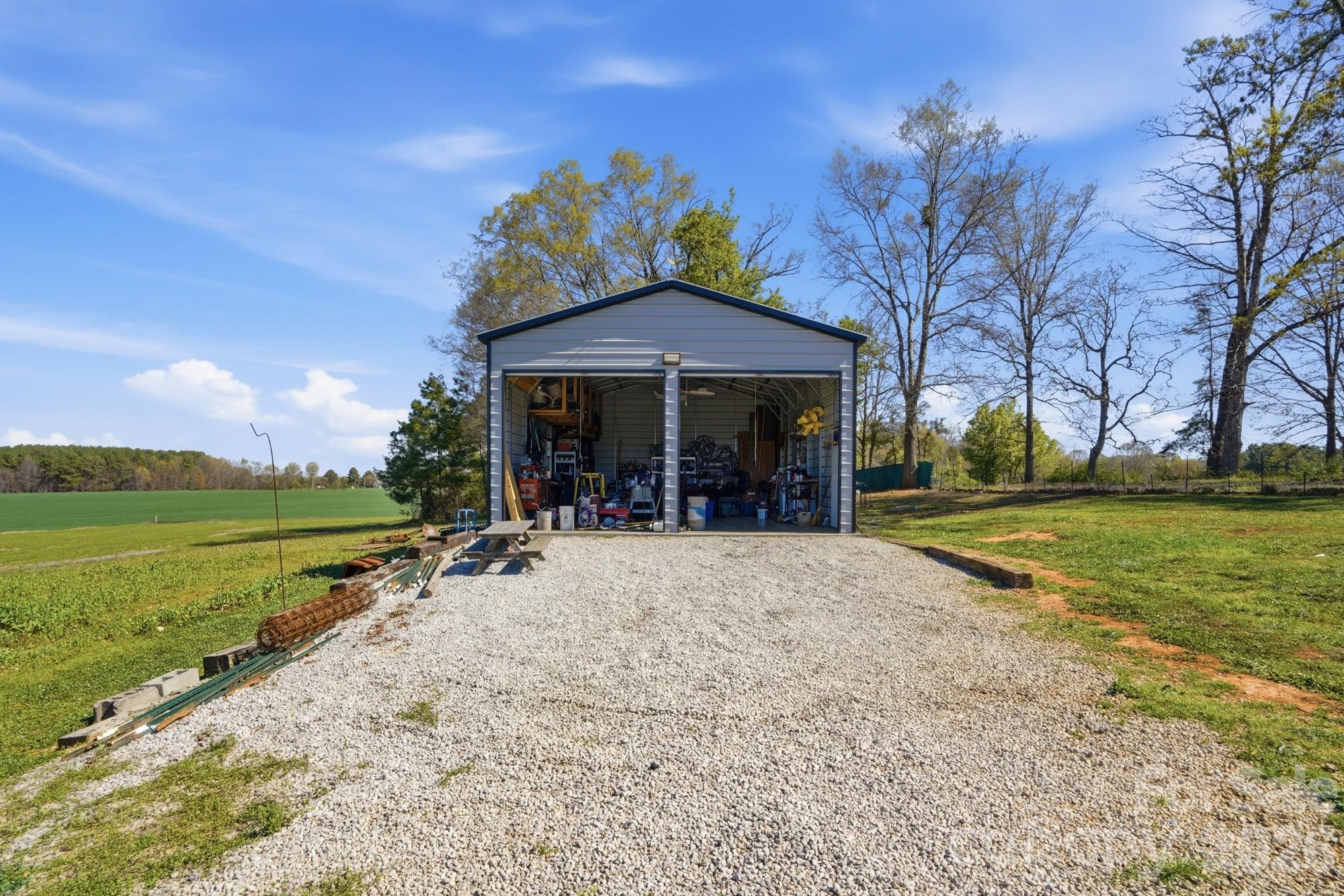 4111 Clontz Taylor Road Marshville, NC 28103 - Photo 24 of 27 a view of a house with a yard