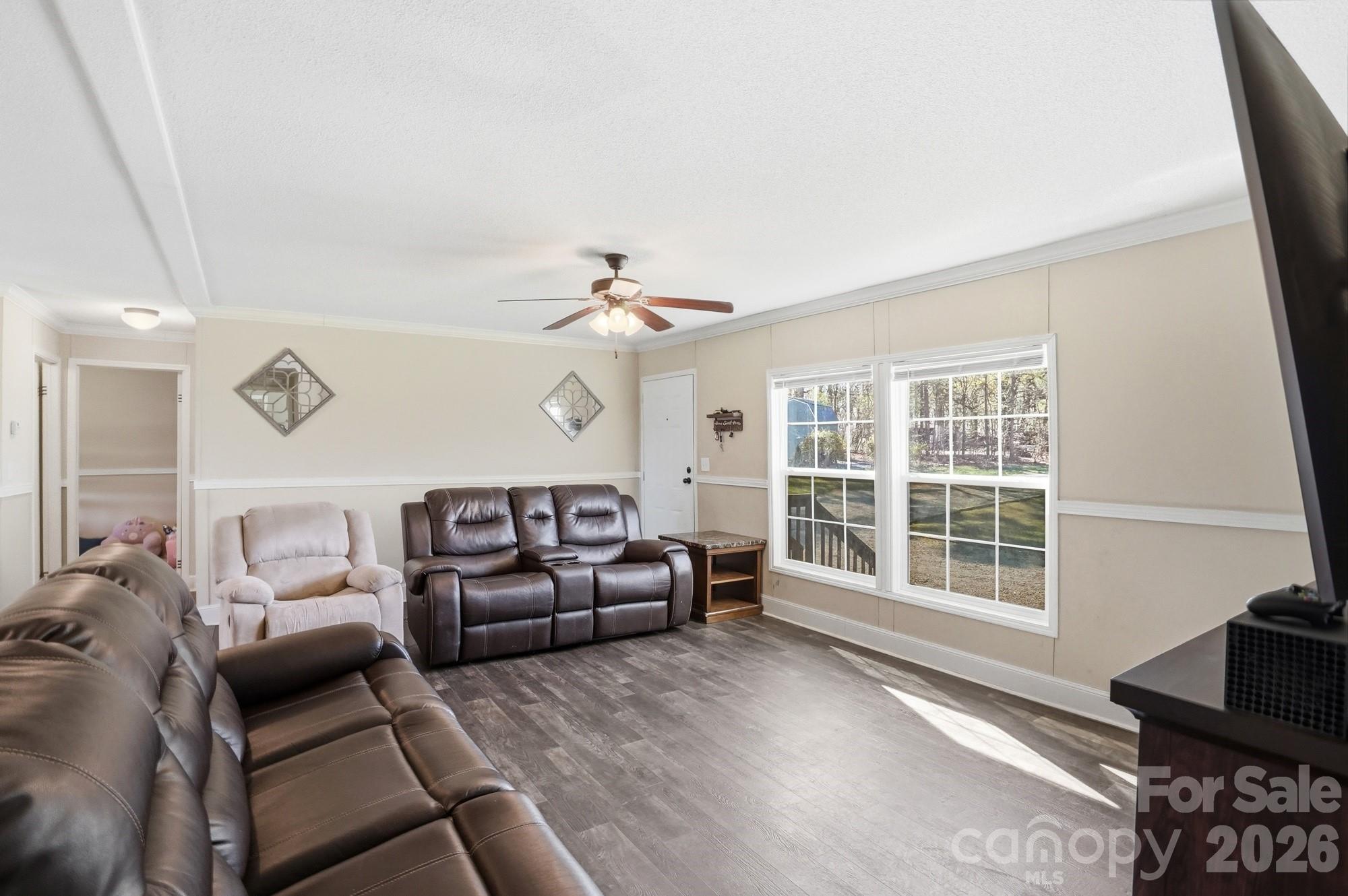 4111 Clontz Taylor Road Marshville, NC 28103 - Photo 3 of 27 a living room with furniture and a window