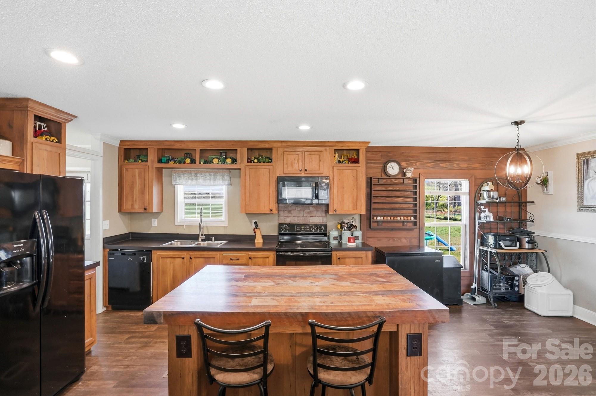 4111 Clontz Taylor Road Marshville, NC 28103 - Photo 8 of 27 a kitchen with a stove and a refrigerator