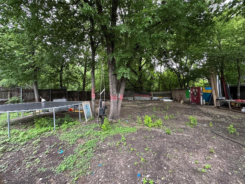4156 Daniel Lane Lancaster, TX 75134 - Photo 9 of 9 a view of a backyard with sitting area