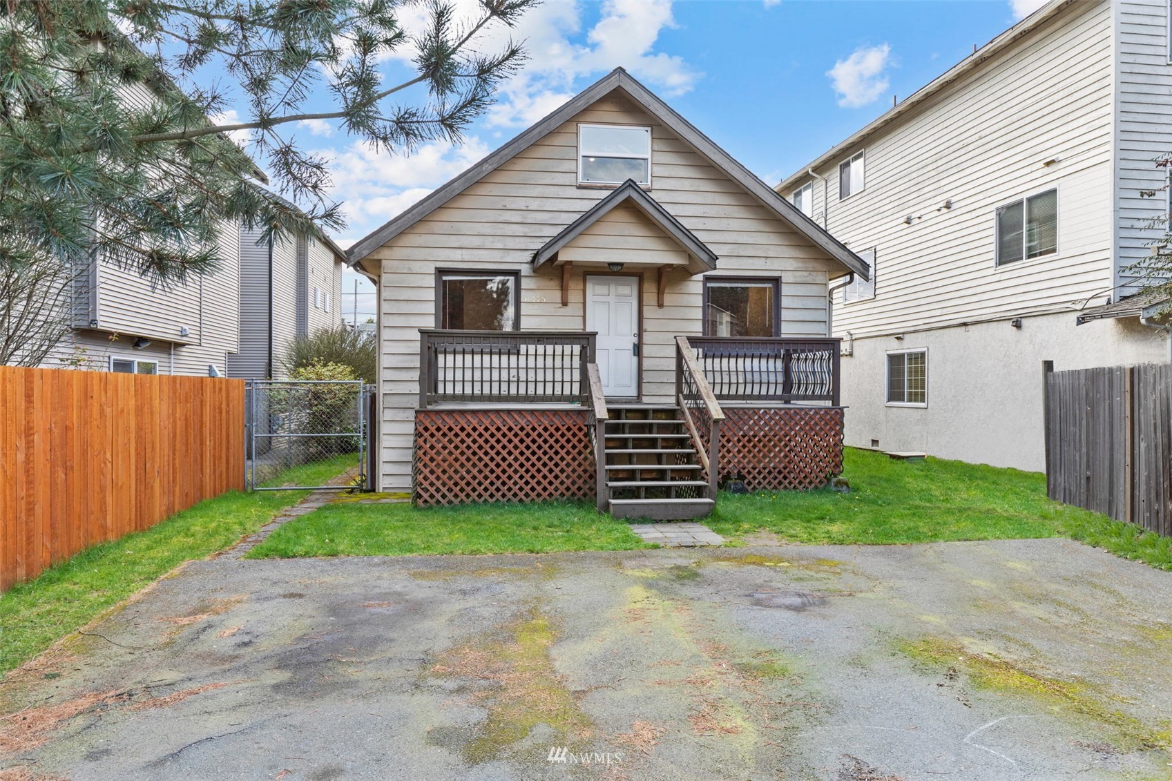10325 Midvale Avenue North Seattle, WA 98133 - Photo 1 of 39 a view of a house with a yard and pathway