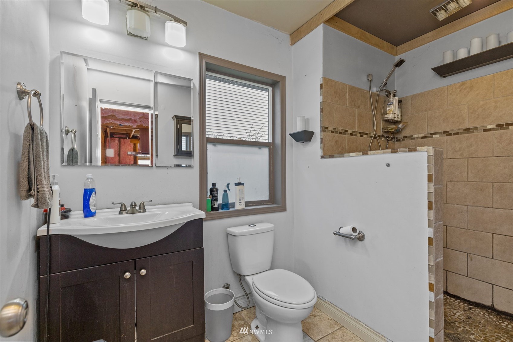 10325 Midvale Avenue North Seattle, WA 98133 - Photo 18 of 39 a bathroom with a sink vanity mirror and toilet
