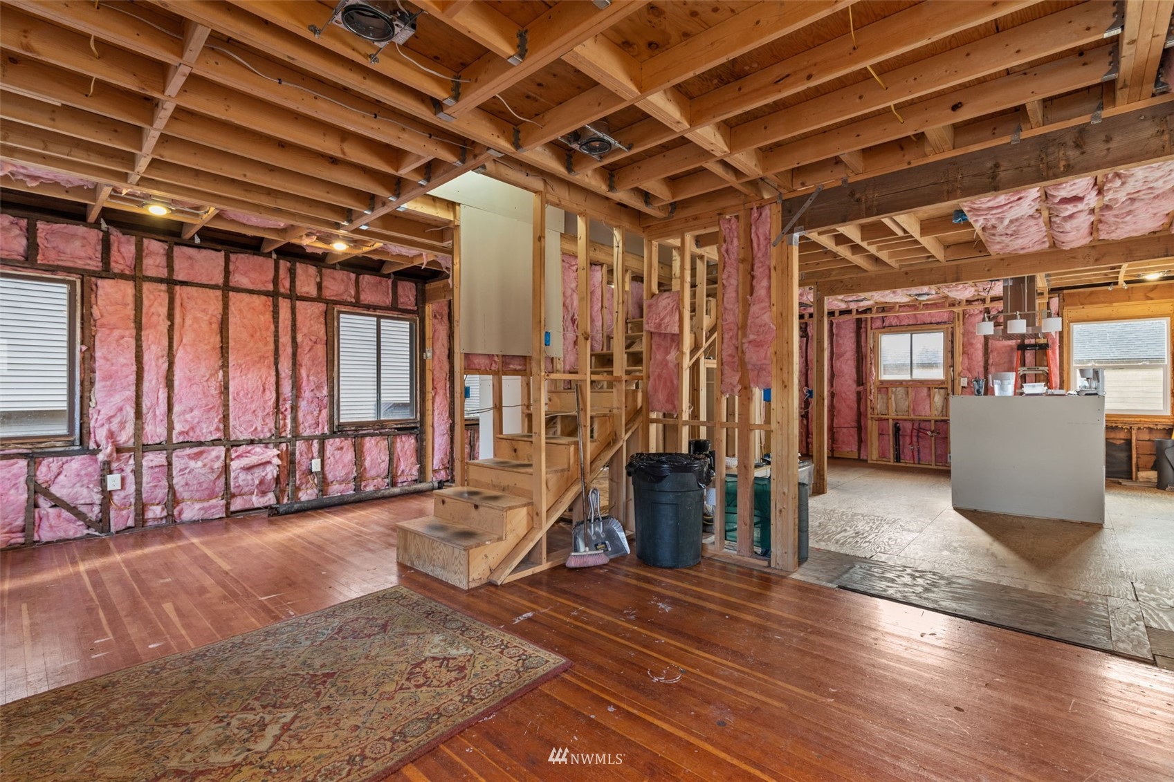 10325 Midvale Avenue North Seattle, WA 98133 - Photo 2 of 39 a view of a hall with wooden floor