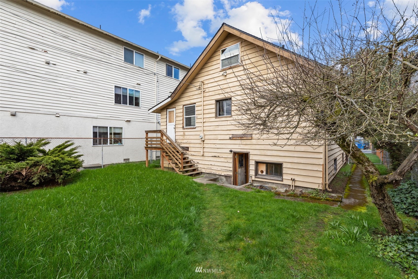 10325 Midvale Avenue North Seattle, WA 98133 - Photo 31 of 39 a view of a house with a yard