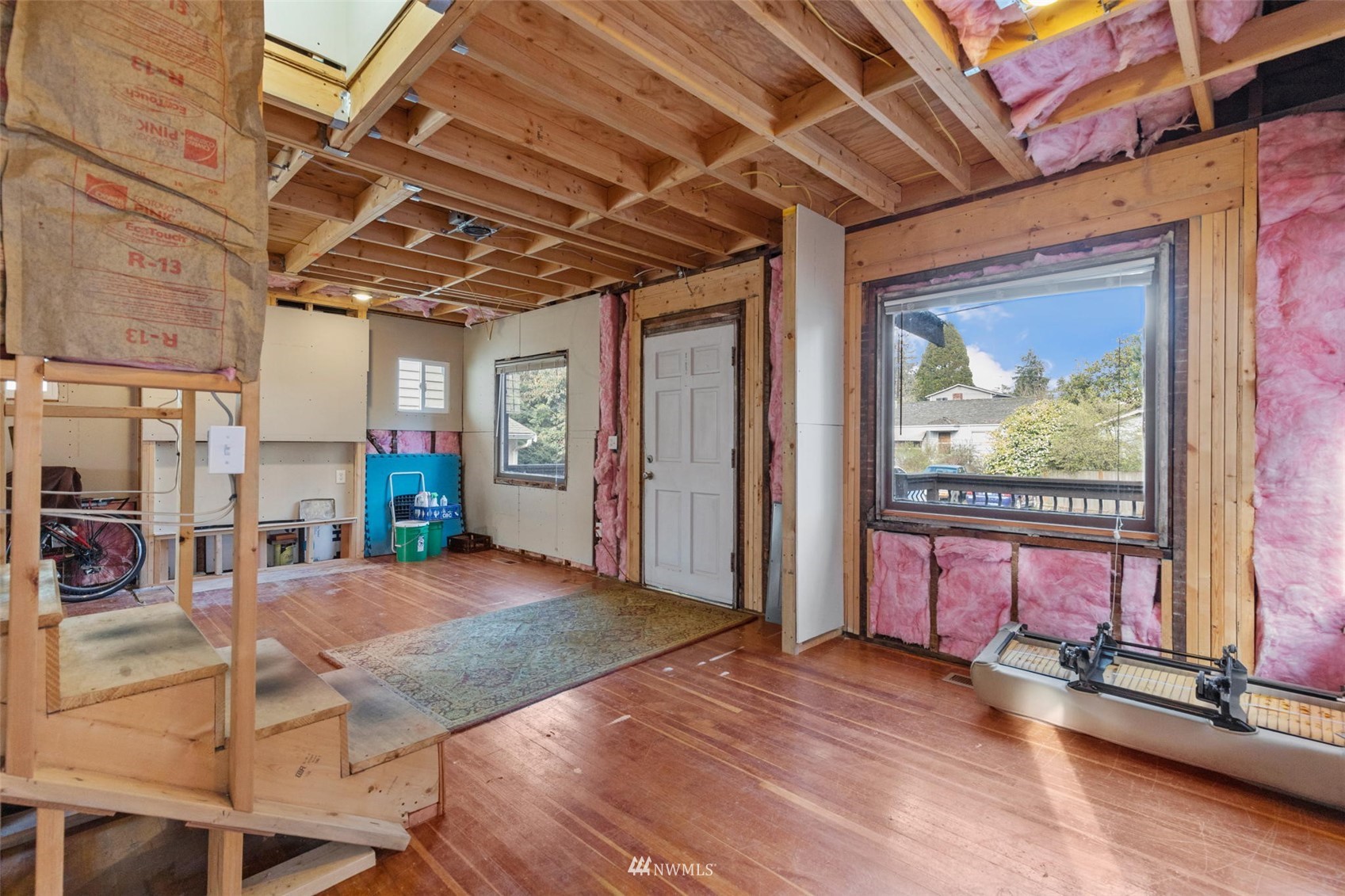 10325 Midvale Avenue North Seattle, WA 98133 - Photo 6 of 39 a view of an entryway with a chandelier