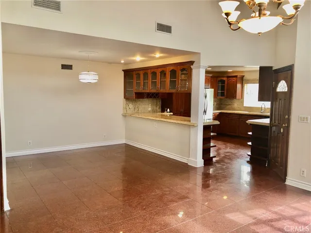 a view of living room and kitchen