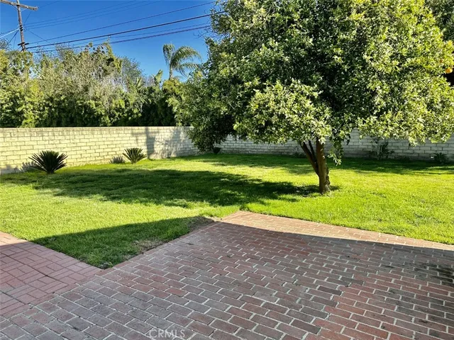 a view of swimming pool with a yard