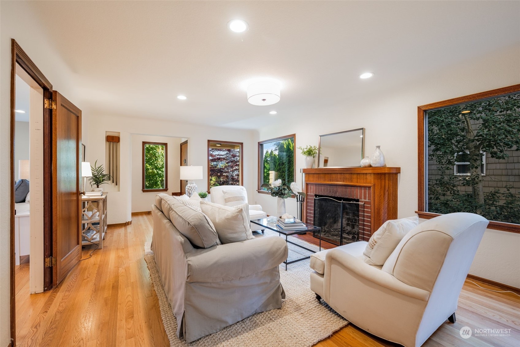 3244 Northwest 59th Street Seattle, WA 98107 - Photo 4 of 40 a living room with furniture and a fireplace