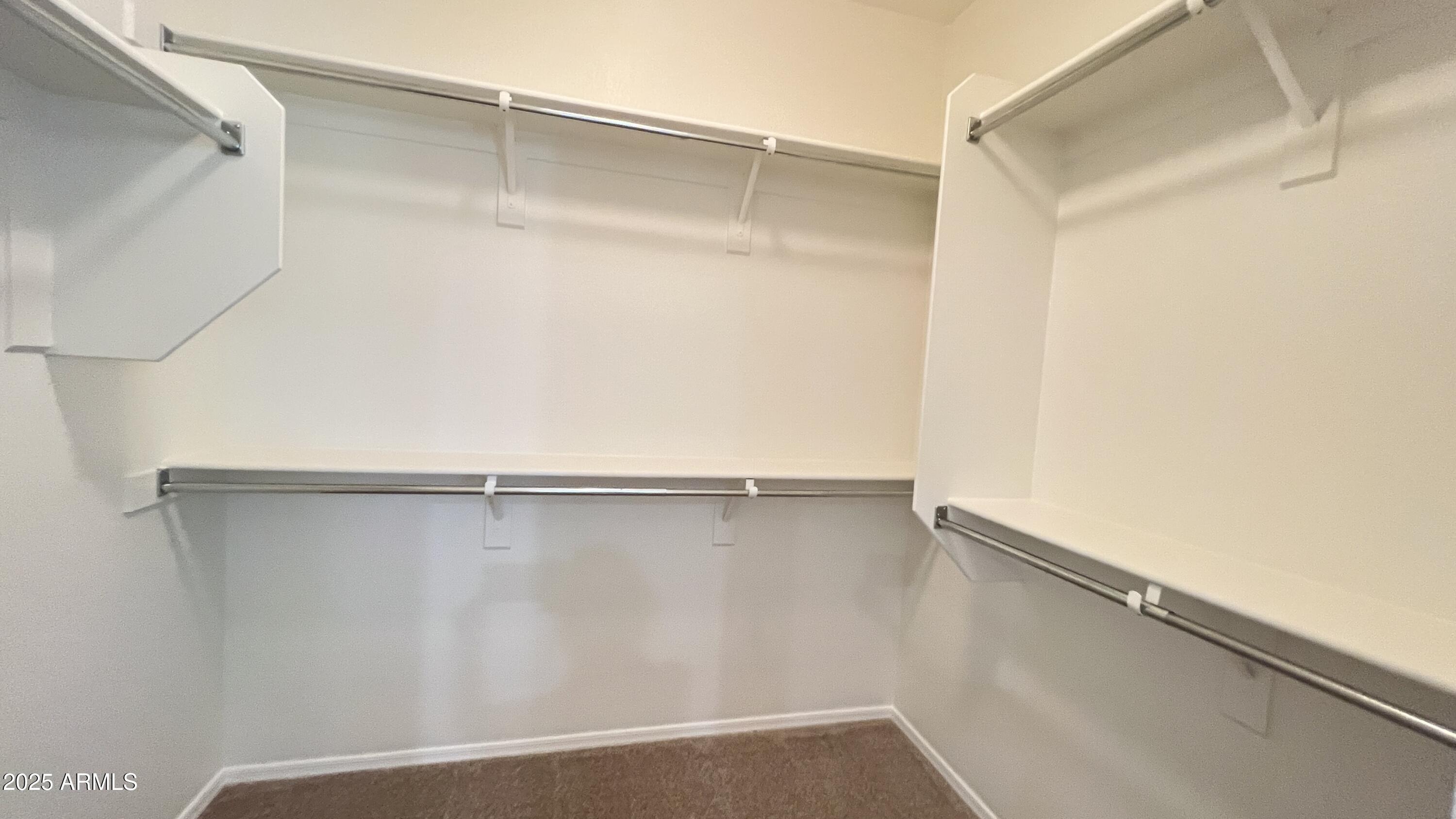 10850 West Avenida Del Rey Peoria, AZ 85383 - Photo 20 of 35 PRIMARY BEDROOM WALK -IN-CLOSET