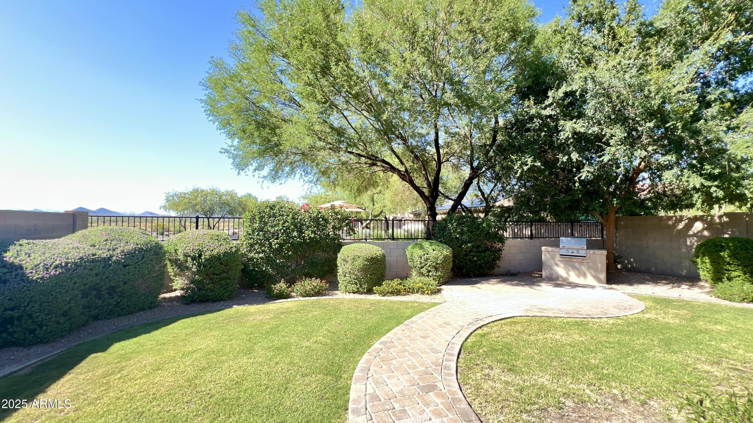 10850 West Avenida Del Rey Peoria, AZ 85383 - Photo 27 of 35 BEAUTIFULLY LANDSCAPED BACKYARD