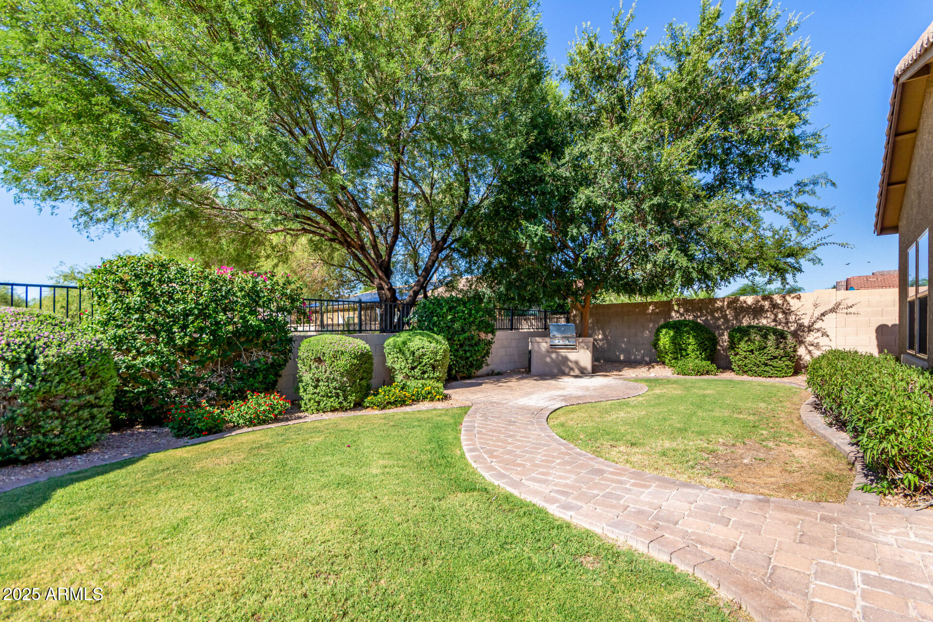 10850 West Avenida Del Rey Peoria, AZ 85383 - Photo 28 of 35 A CANOPY OF MATURE GREENERY