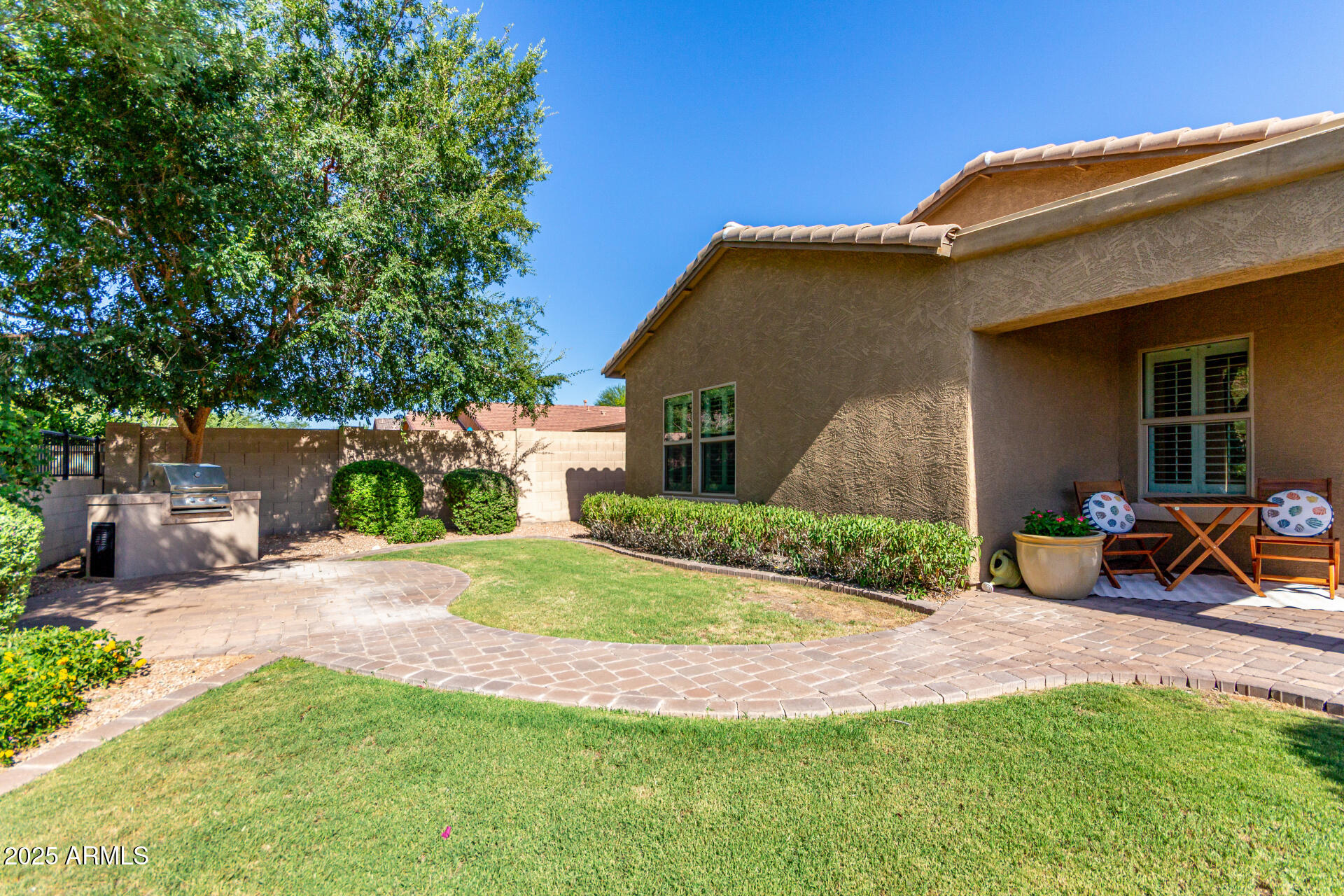 10850 West Avenida Del Rey Peoria, AZ 85383 - Photo 29 of 35 CHARMING PAVER WALK WAY