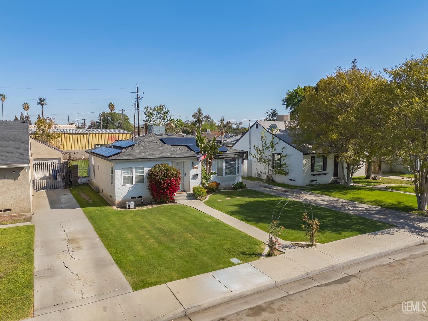 a view of a swimming pool with a patio