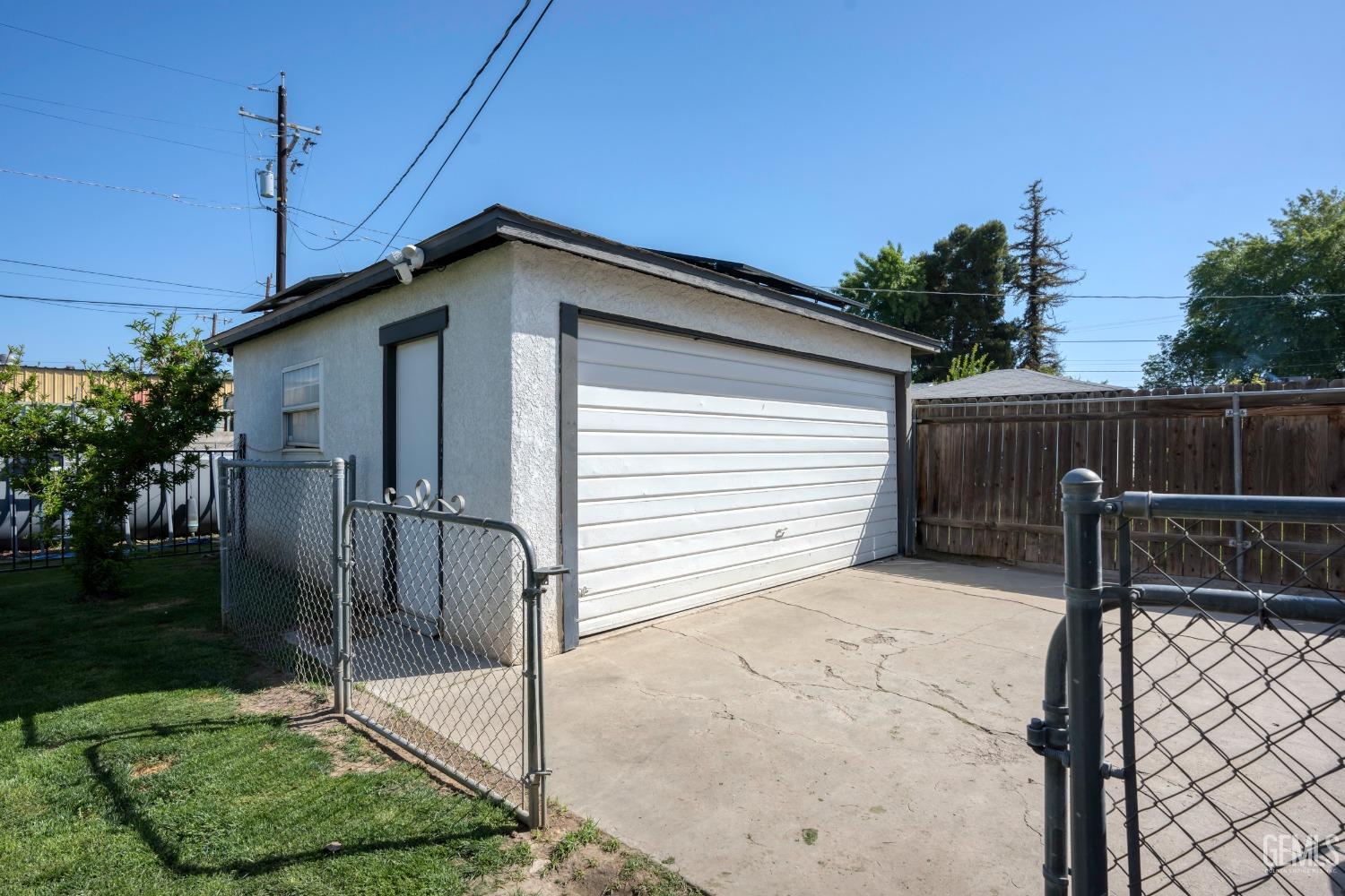 Undisclosed Address Bakersfield, CA 93304 - Photo 23 of 31 a house view with a backyard space