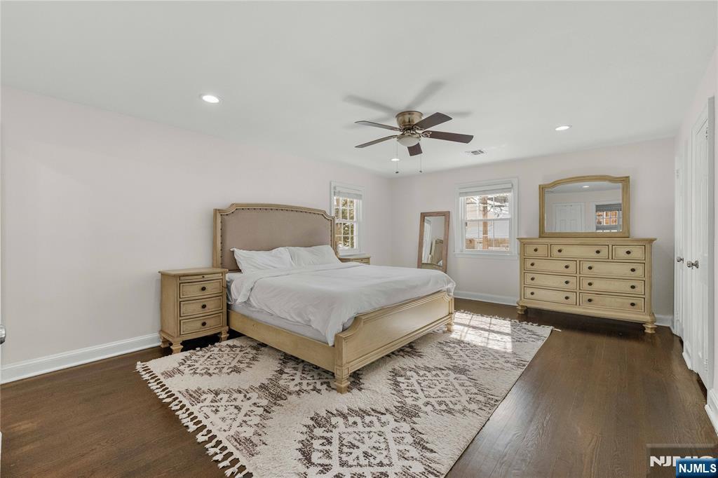 609 Wyndham Road Teaneck, NJ 07666 - Photo 12 of 26 a bedroom with a bed and a cabinets