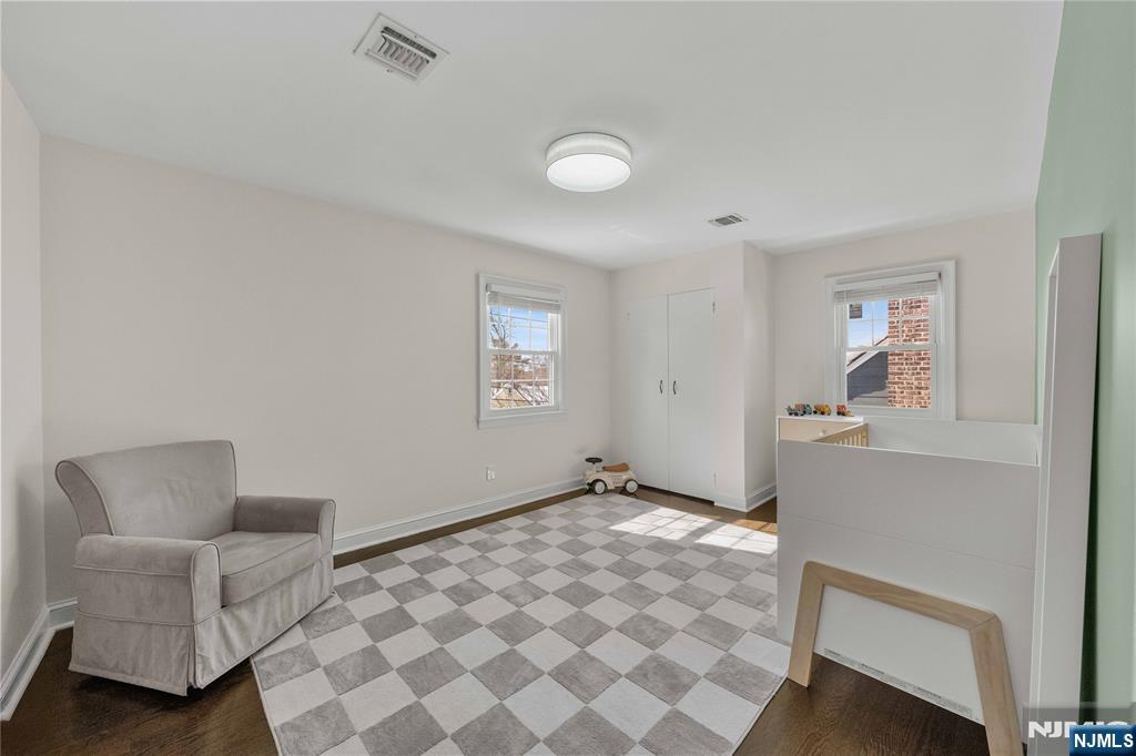 609 Wyndham Road Teaneck, NJ 07666 - Photo 6 of 26 a view of livingroom with furniture and window