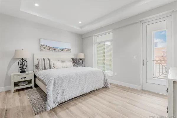 a view of entryway with wooden floor