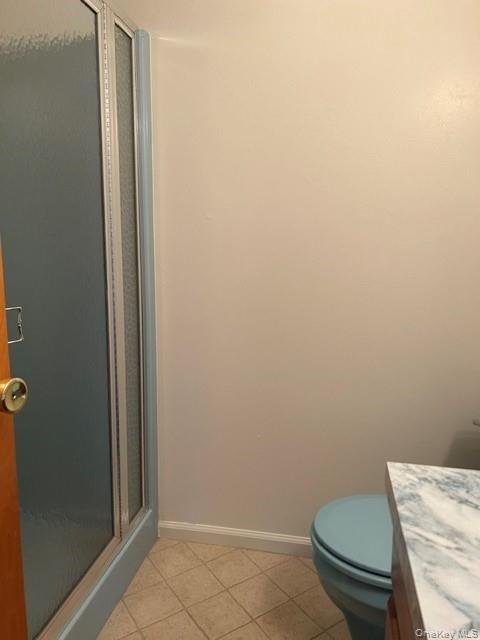 2 Scism Circle Red Hook, NY 12571 - Photo 16 of 29 a white toilet sitting next to a shower