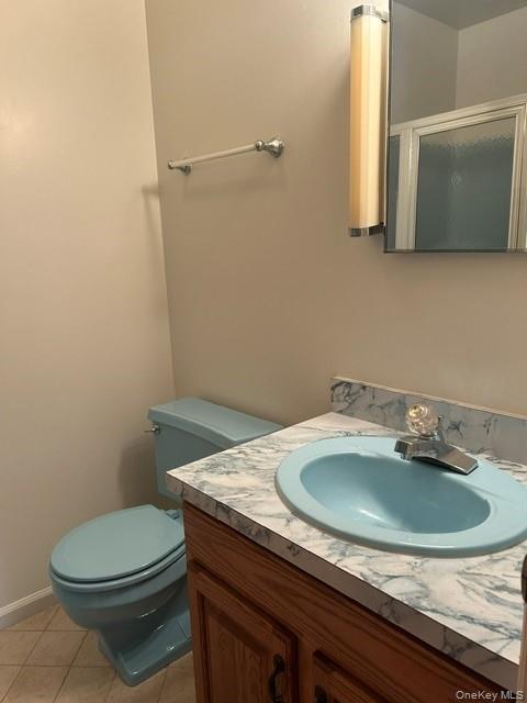 2 Scism Circle Red Hook, NY 12571 - Photo 17 of 29 a bathroom with a granite countertop toilet sink and mirror