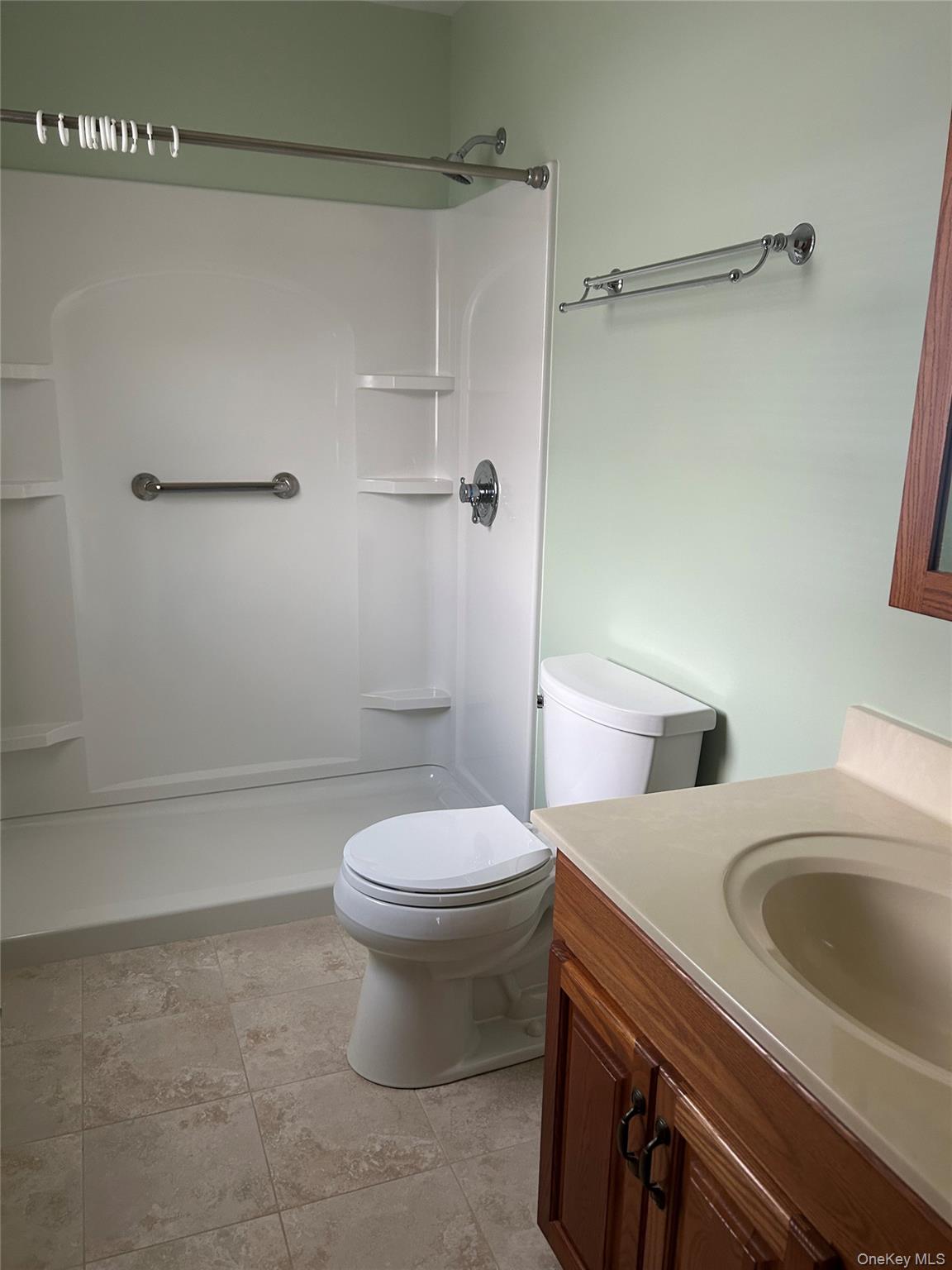 2 Scism Circle Red Hook, NY 12571 - Photo 20 of 29 a bathroom with a sink a toilet and shower