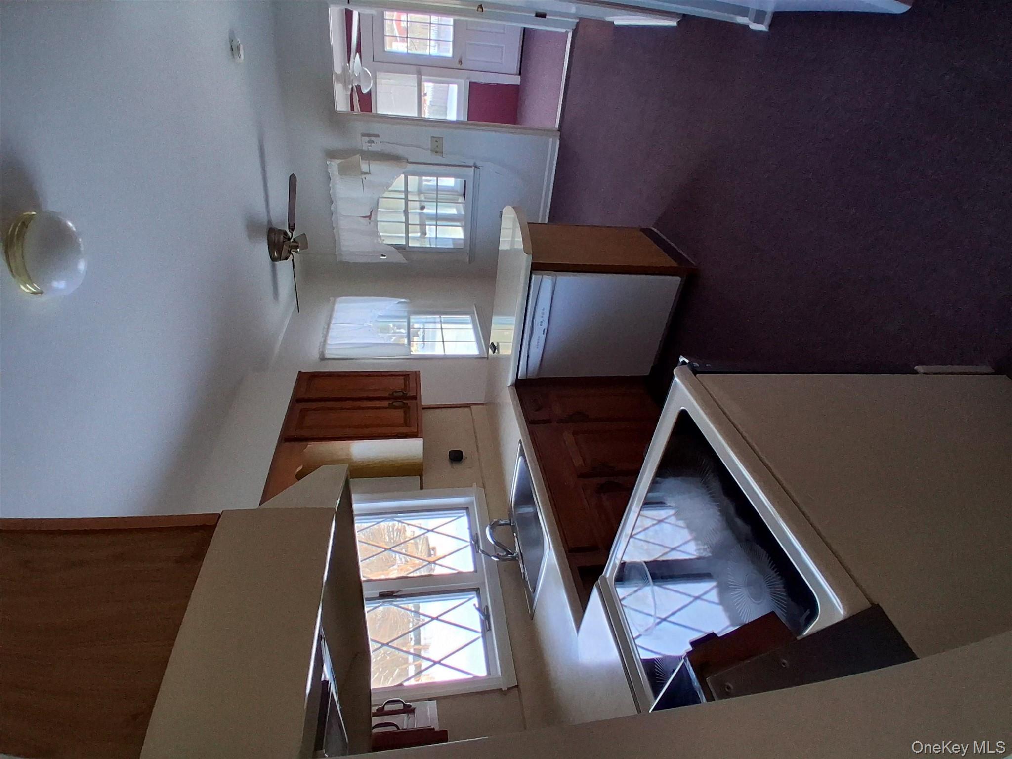 2 Scism Circle Red Hook, NY 12571 - Photo 7 of 29 a living room with furniture and windows