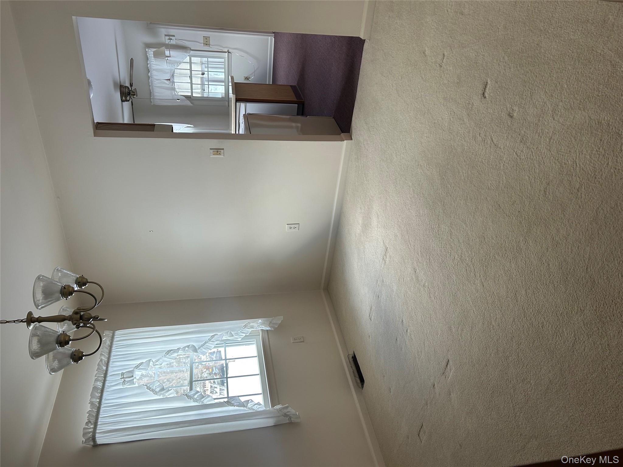 2 Scism Circle Red Hook, NY 12571 - Photo 9 of 29 en empty room with windows and ceiling fan