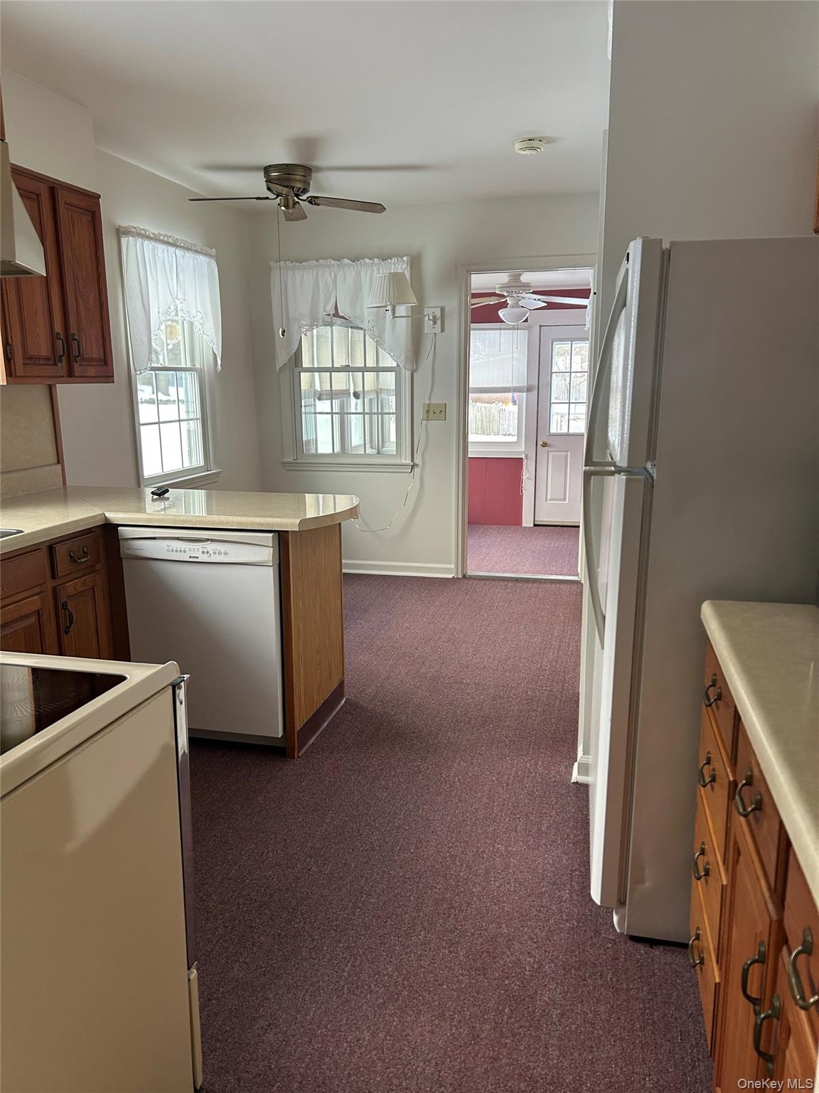2 Scism Circle Red Hook, NY 12571 - Photo 10 of 29 a kitchen with refrigerator and window