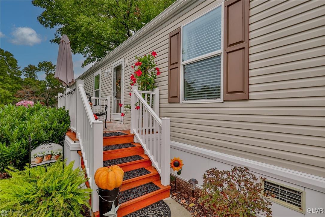8711 Turkey Ridge Road Breinigsville, PA 18031 - Photo 7 of 40 a balcony view with a potted plant