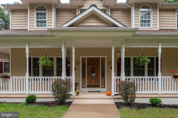 front view of a house with a small yard