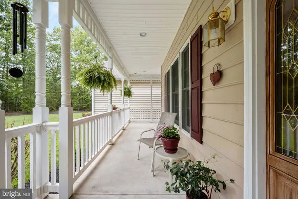 a view of a balcony with plants