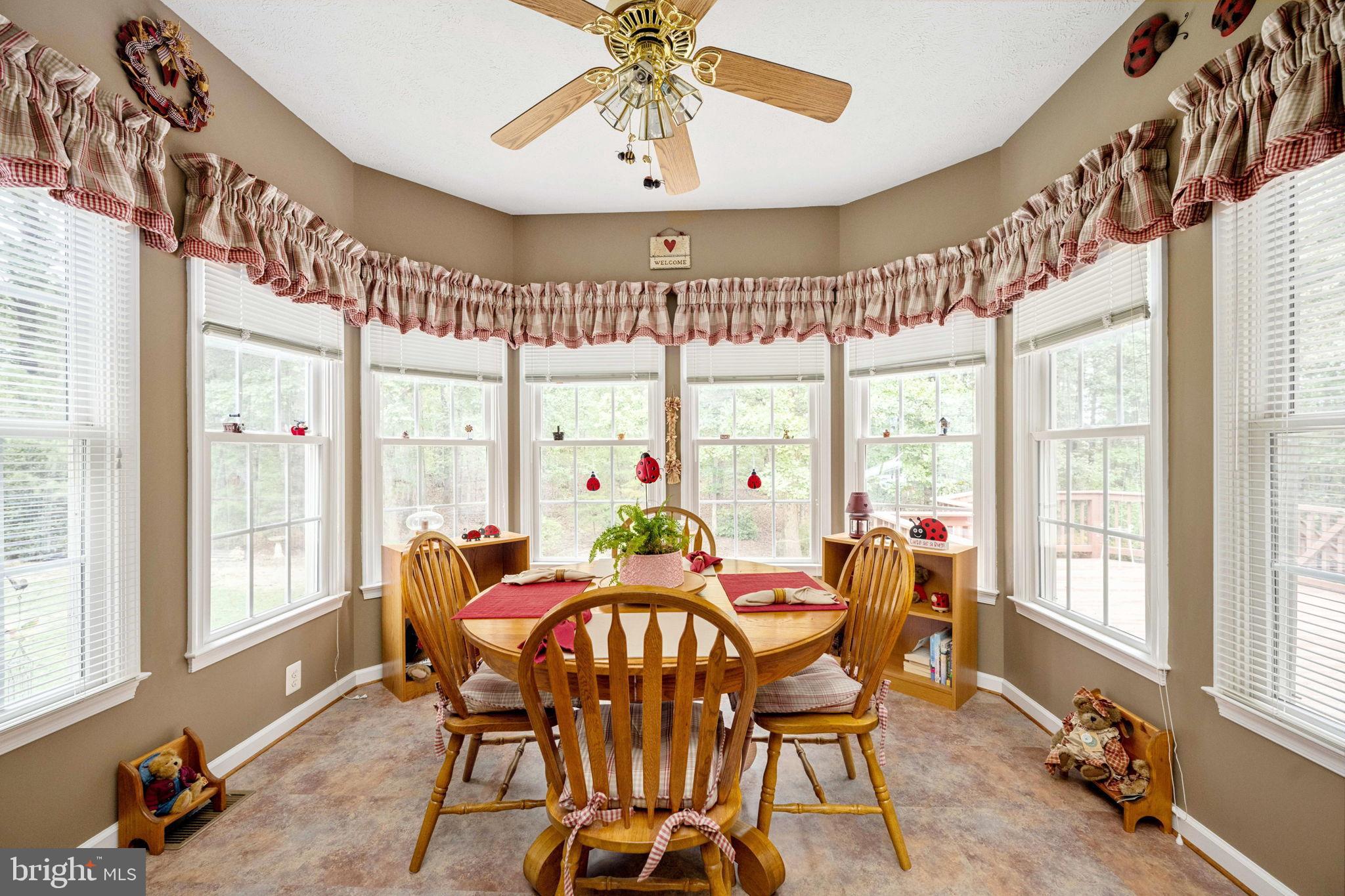 32236 Deep Meadow Lane Locust Grove, VA 22508 - Photo 31 of 58 sunlit dining nook/kitchen table area