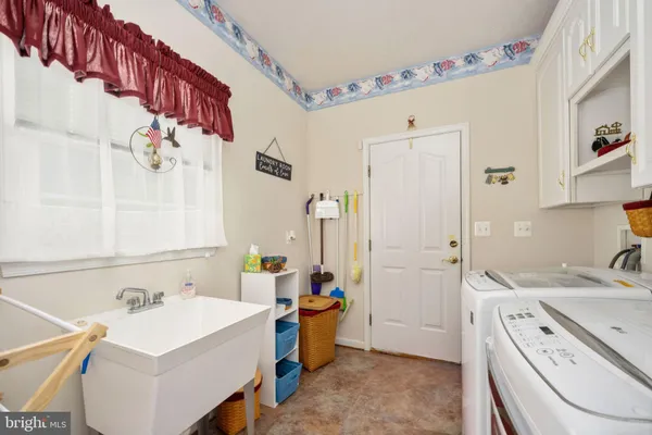 a view of a hallway with seating area
