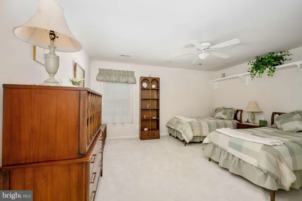 a view of a hallway with stairs