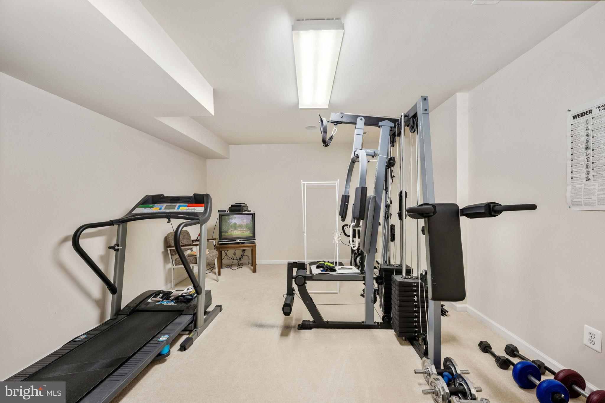 32236 Deep Meadow Lane Locust Grove, VA 22508 - Photo 42 of 58 Spacious home gym for fitness enthusiasts.