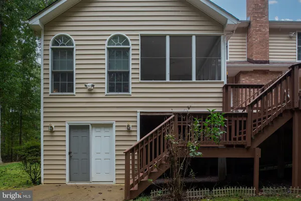 a view of backyard with green space