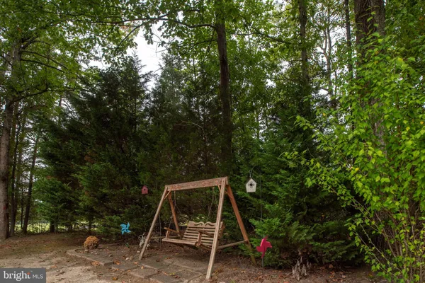 an aerial view of a house with a garden