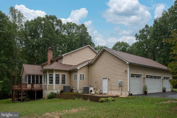 a aerial view of a house with garden