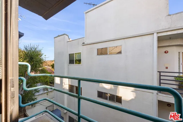 a house view with a outdoor space