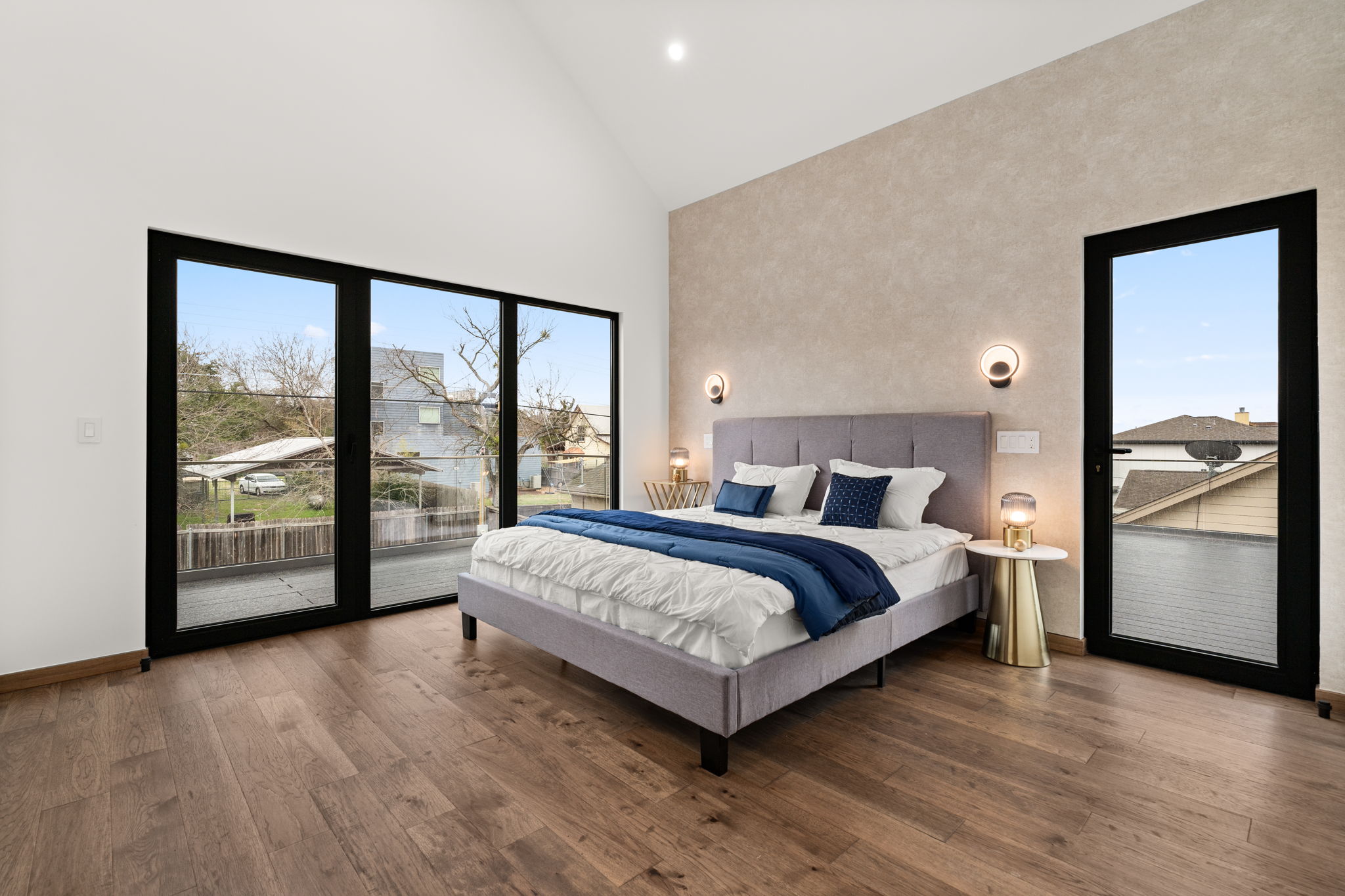 2915 Chisholm Trail Austin, TX 78734 - Photo 20 of 35 a spacious bedroom with a large bed and a large window